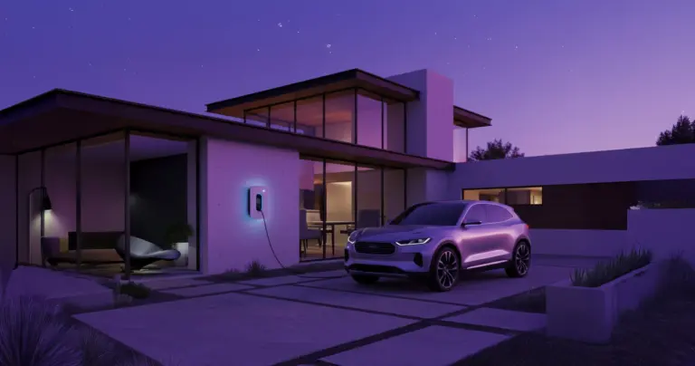 An SUV charging to an EV EASSEE charger, outside a home in Windsor