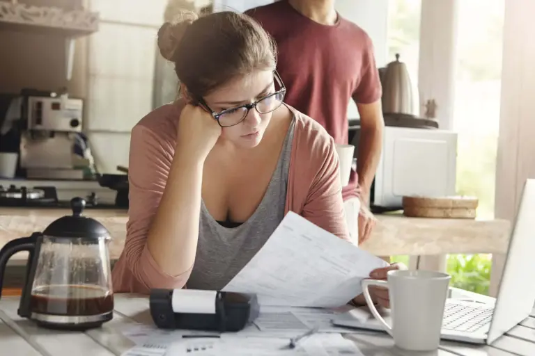 A woman frustrated at her high energy bills